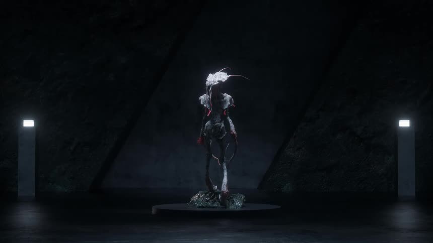 A strange alien creature with red tentacles on display on a museum
