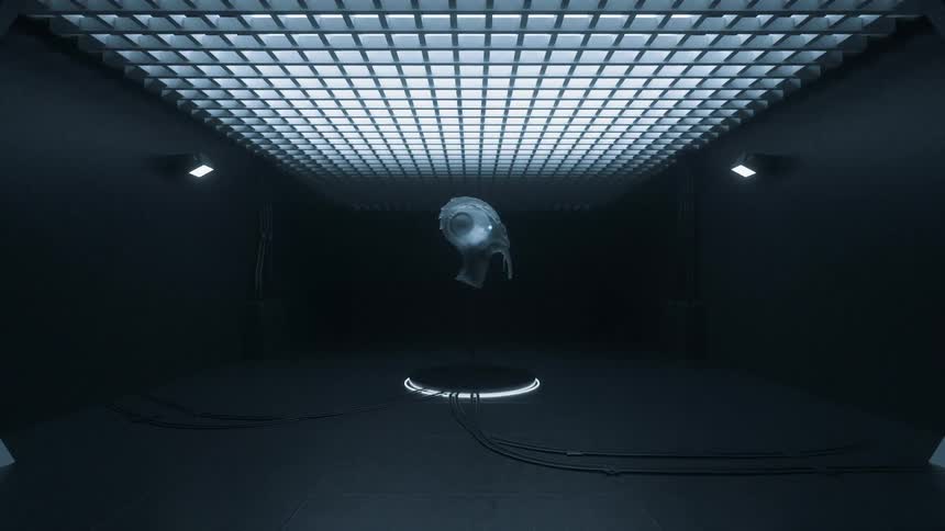 An alien head is on displaey in a futuristic room