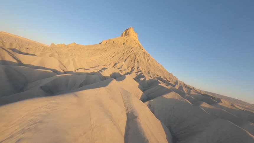 The sky is clear over the desert