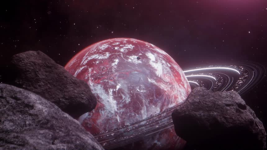 A ringed planet behind asteroids floating in space