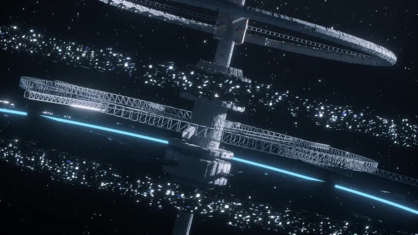 Space station slowly rotates in space as light reflects off rings