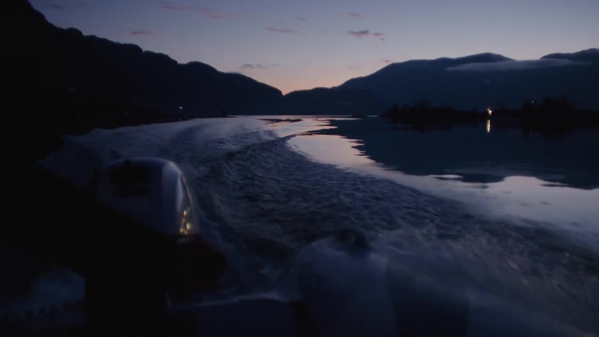 The boat is traveling in the water
