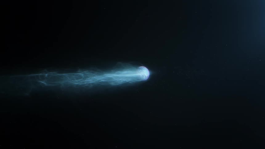Comet trailing vapor glows as it travels through space