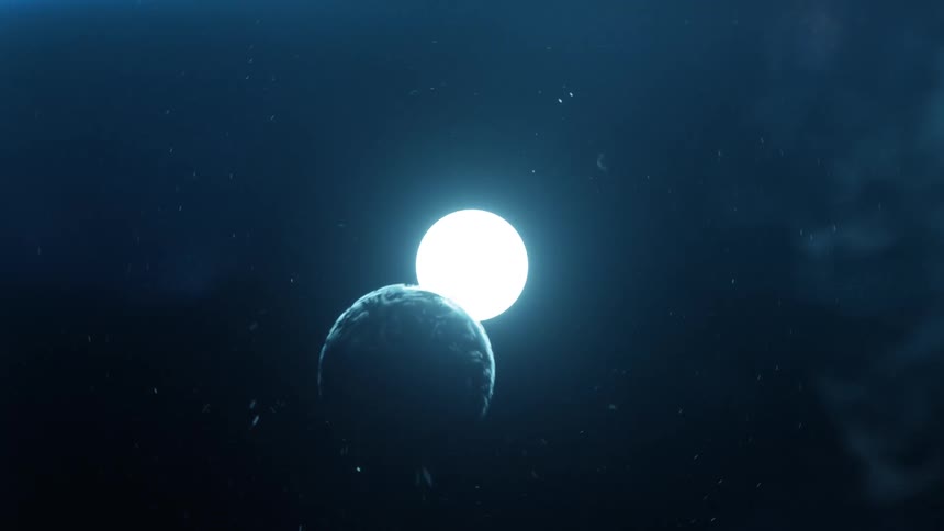 Clouds breaking into the moon and the planet earth and then into the ocean
