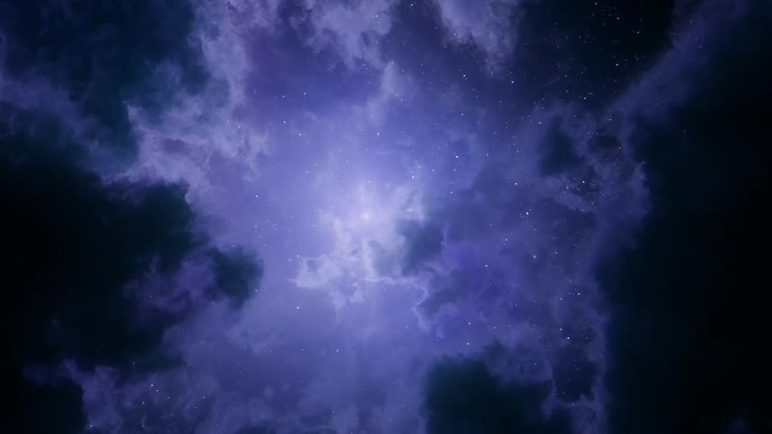 A glowing purple light and clouds in a dark sky