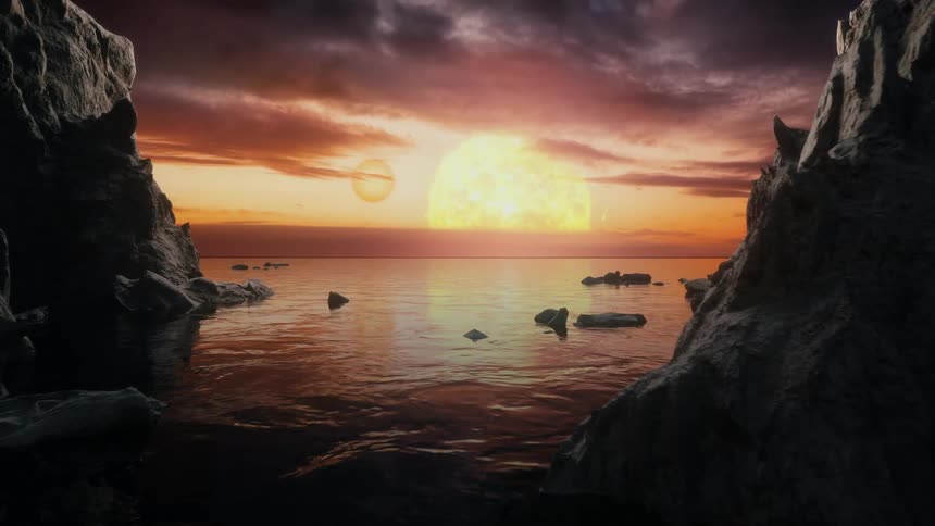Twin sunset is reflected in the water between rock formations