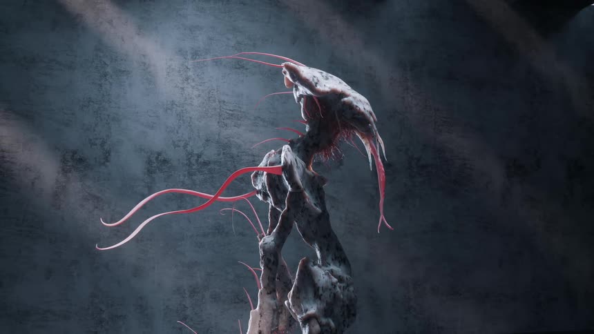 A strange alien creature with red tentacles on display