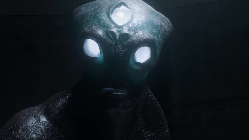 The face of an alien creature is revealed