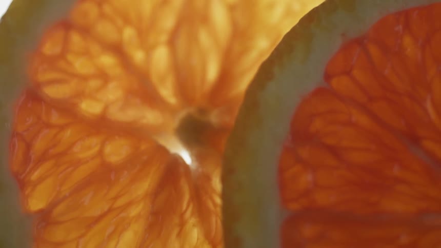 Oranges are cut and on display