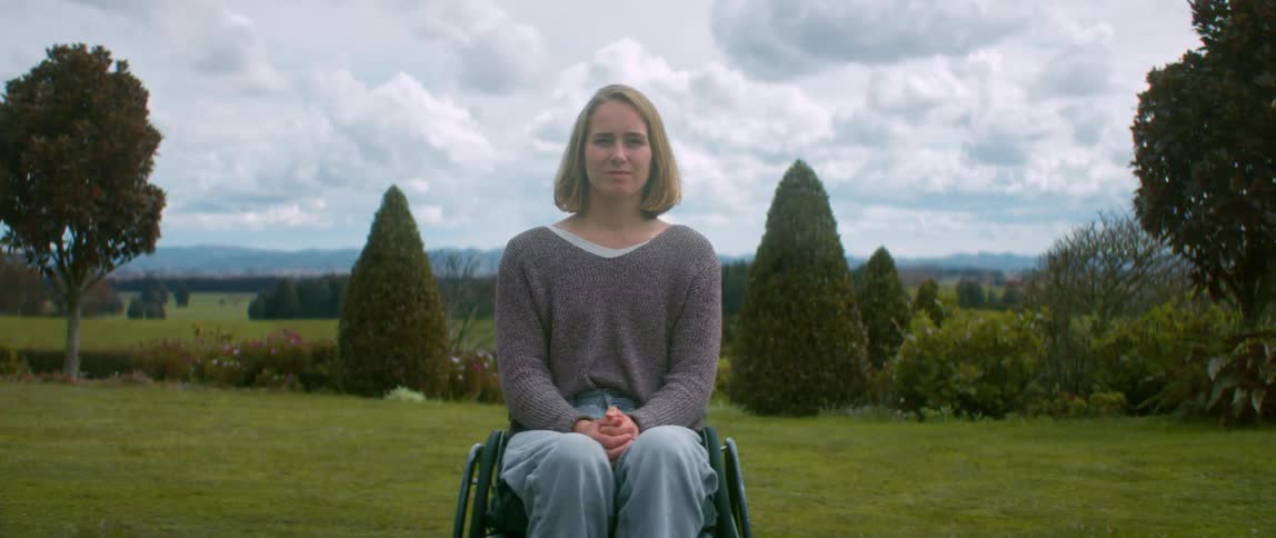 A woman sitting outdoors