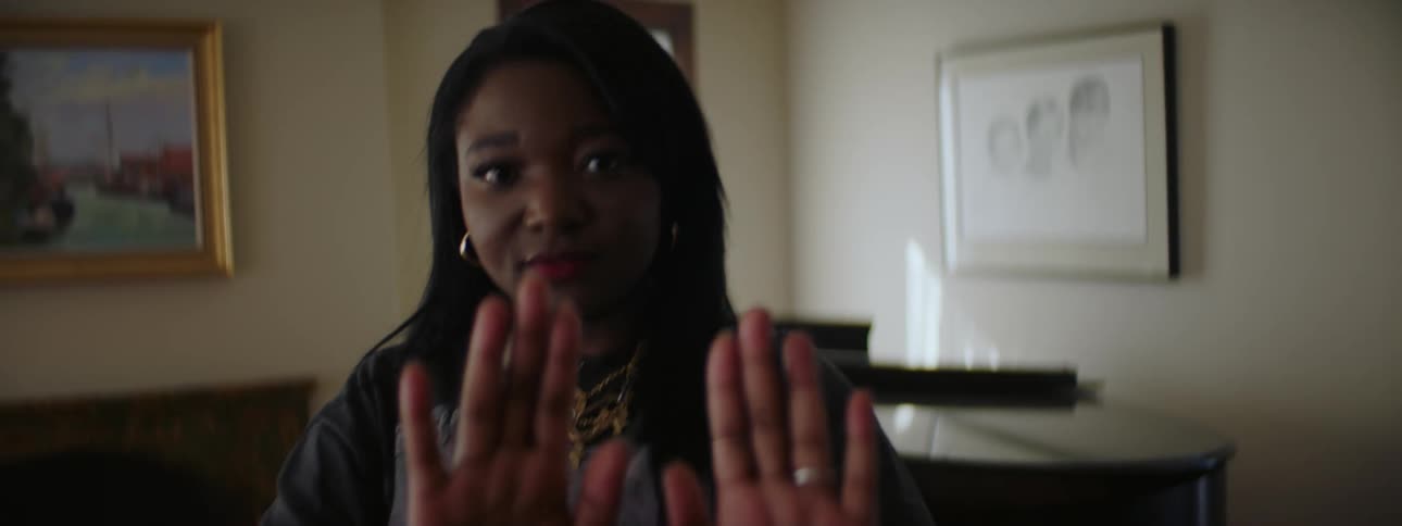 A woman is moving her hands around