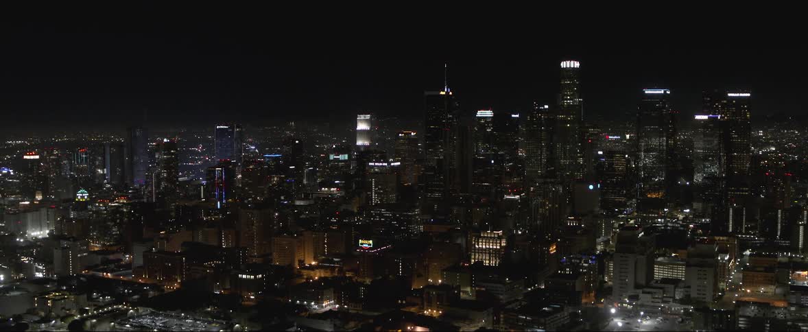 The city is brightly lit at night