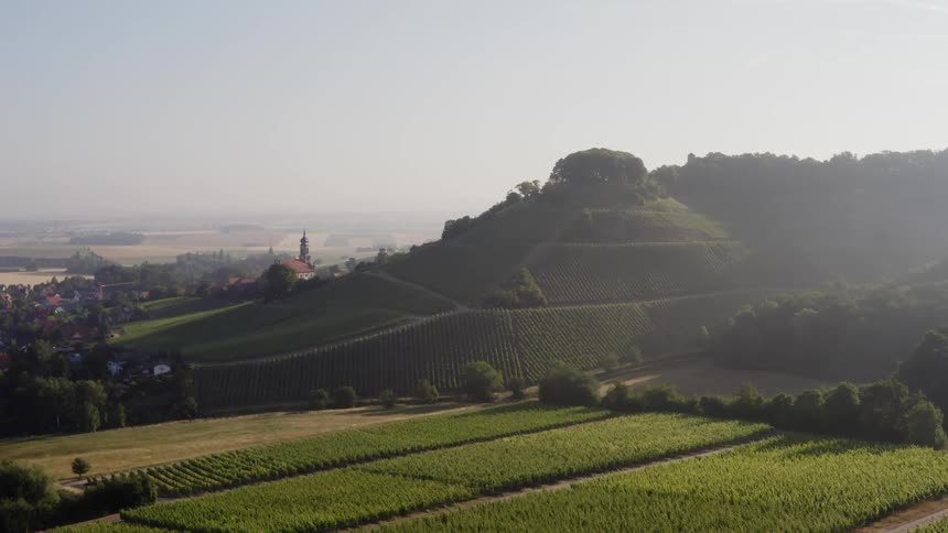 Aerial view of an open landscape during spring is displayed