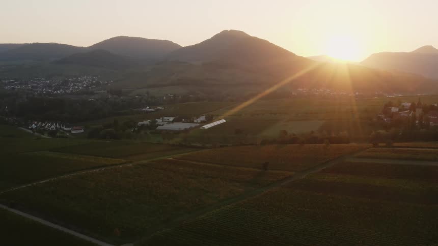 The sun is rising on the farm