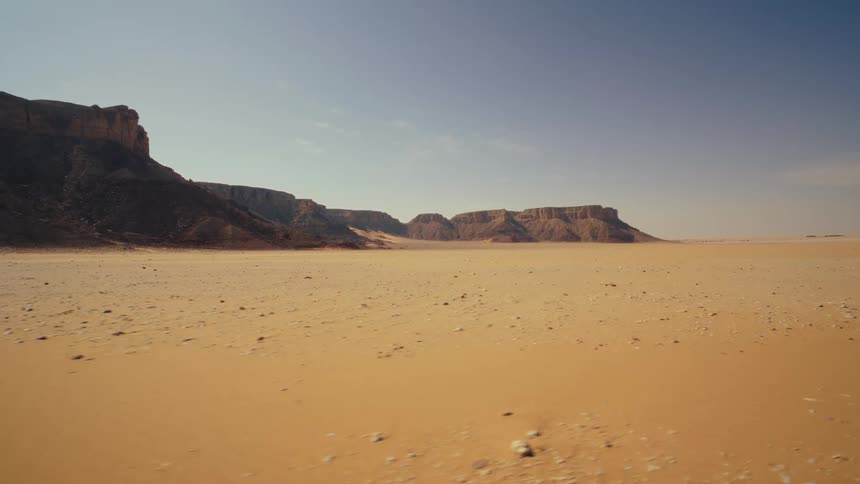 A tracking shot of a desert landscape in Saudi Arabia