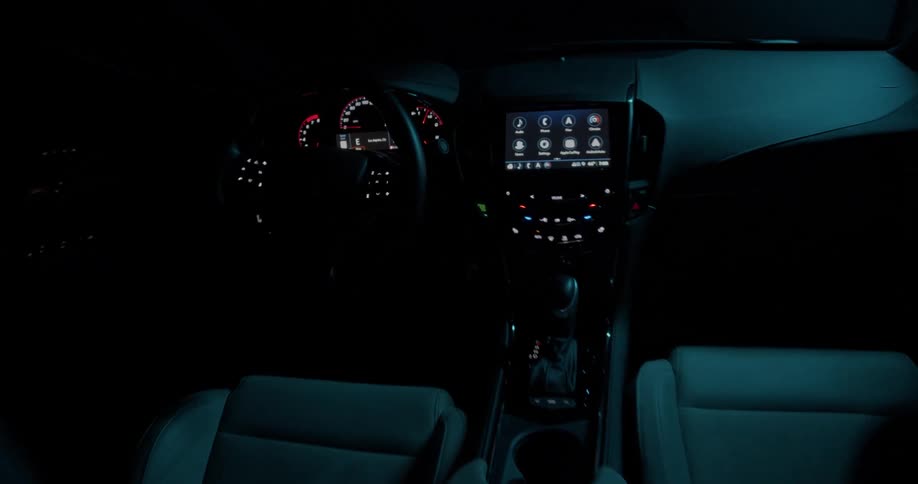 A vehicles dashboard is lit up with no one inside