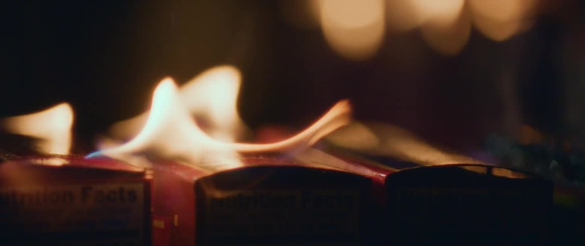Shot of a cereal box burning