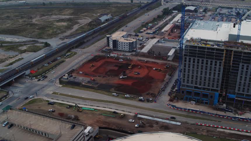 An aerial view of buildings and streets in a city