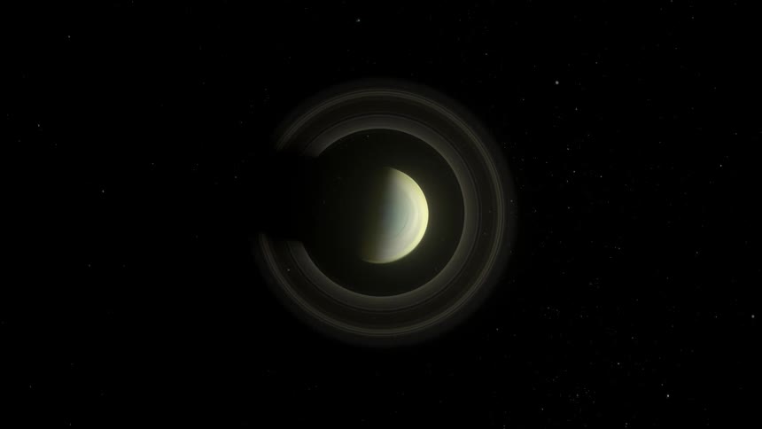 Saturn is seen from above as it rotates slowly in space