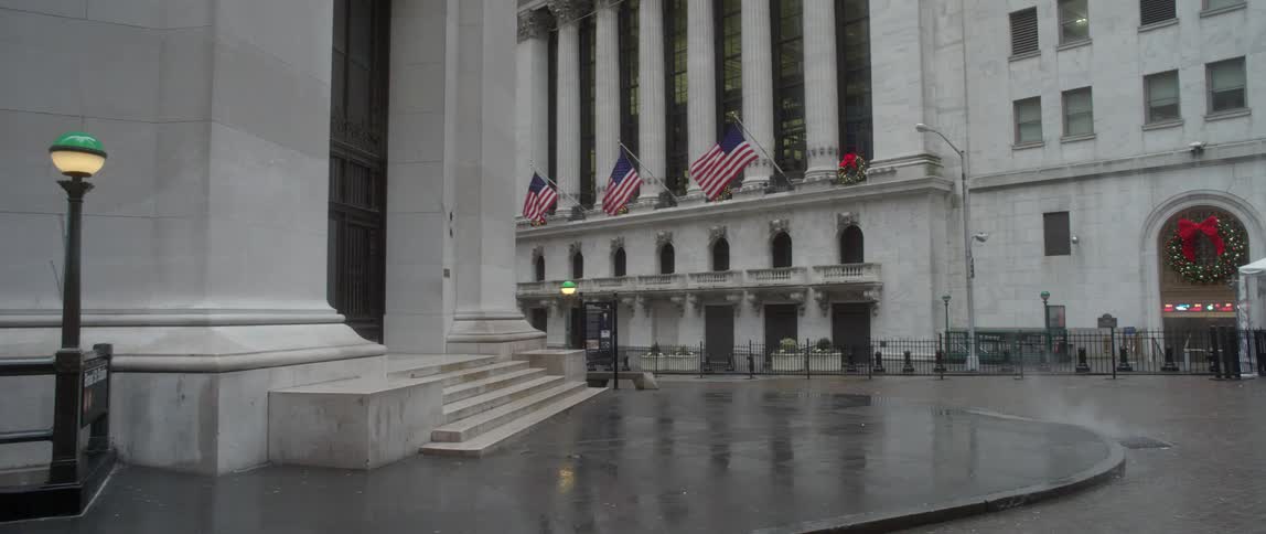 Flags blow in the wind on this building