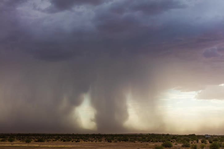 A wide strong monsoon downburst/microburst over the desert