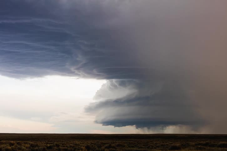 A monster supercell moves across the landscape