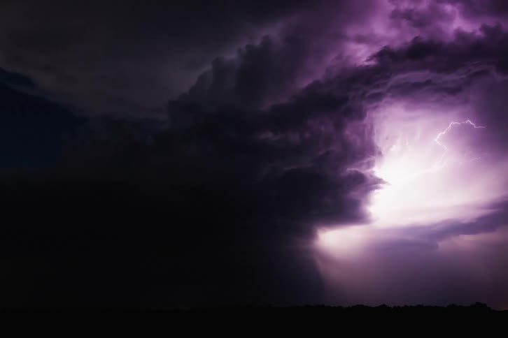 Storm with heavy thunder and lightning at night