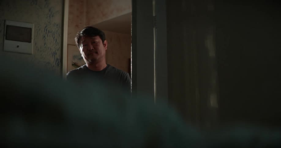 Father gets out of the room and closes the door while looking at his daughter in room