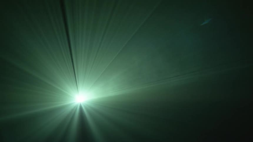 A spot light in a dark room