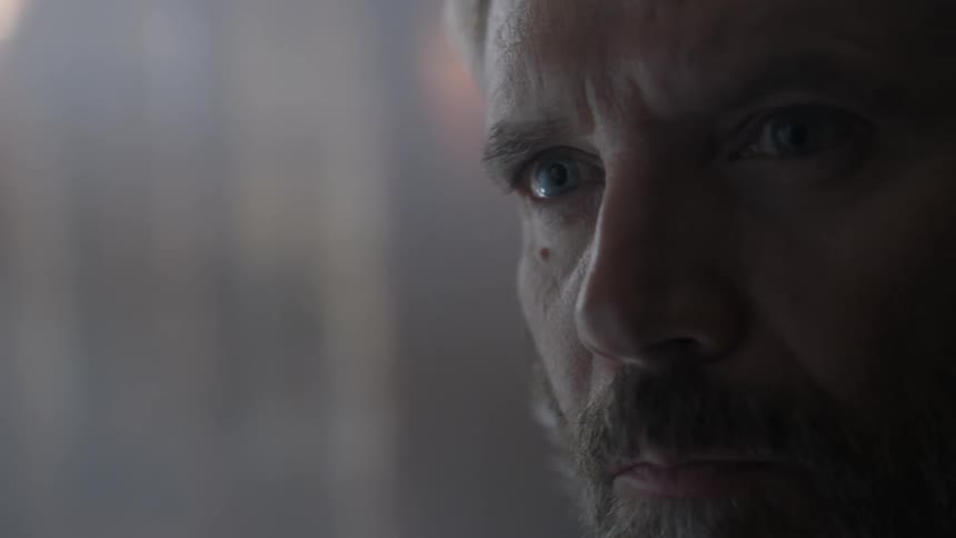 Bearded man  staring curiously and then walking away
