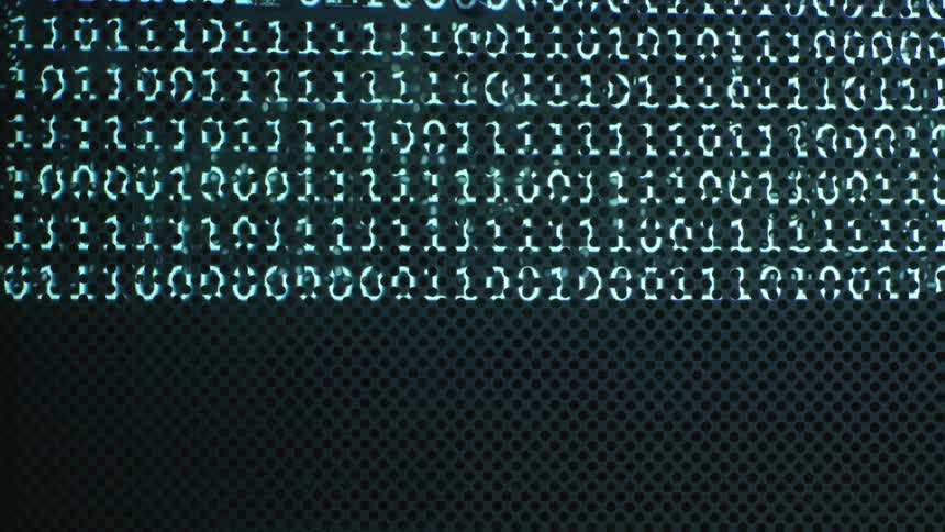 A monitor is displaying flashing numbers