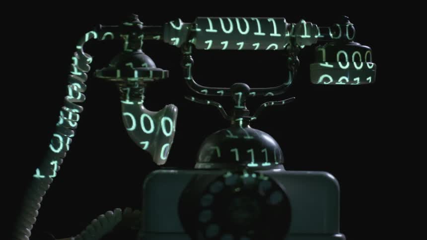 A projection of numbers lights up on a phone