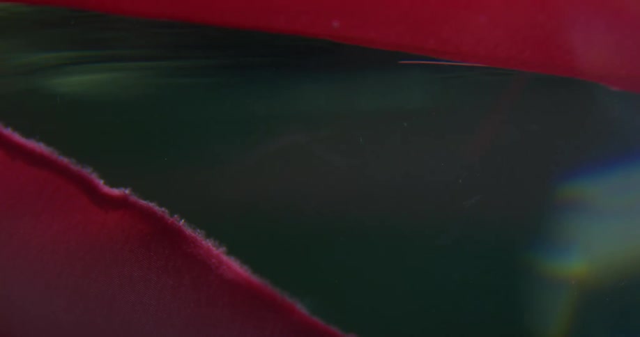 A floating red banner moving in the left direction with the wave of water