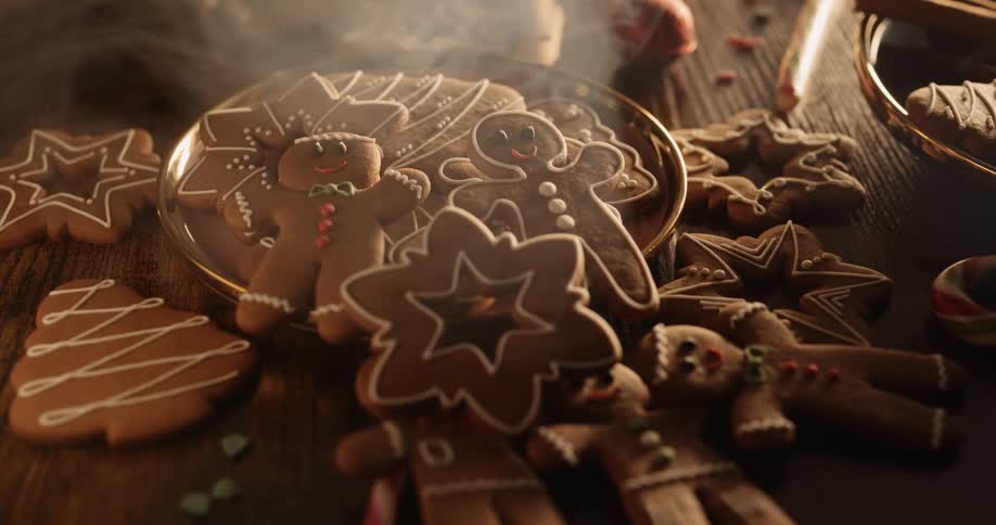 Smoke hovering over a pile of gingerbread cookies on a table