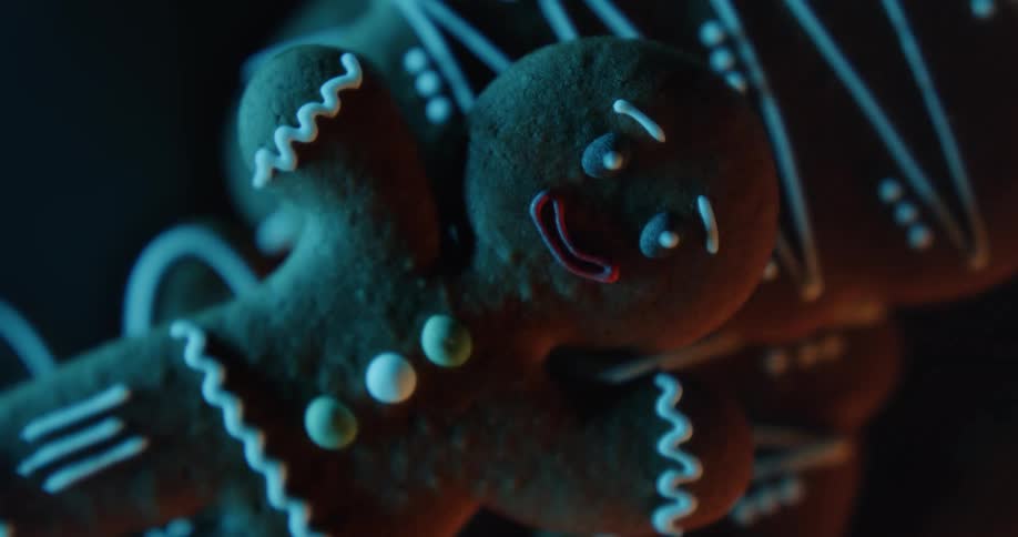 Gingerbread man cookies are piled high on a platter