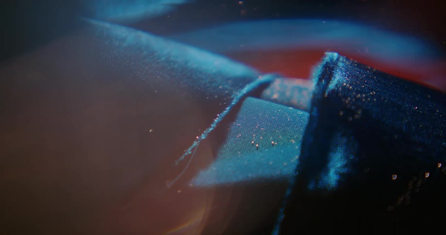 A shining blue cloth moving with the wave