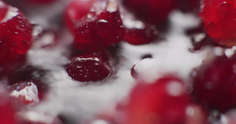 Water is being poured on the berry fruit