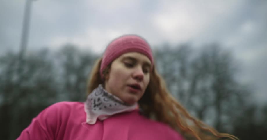 A woman stretching outdoors