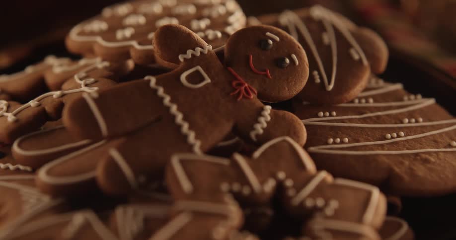 A chocolate cookie decorated like a toy with icing design