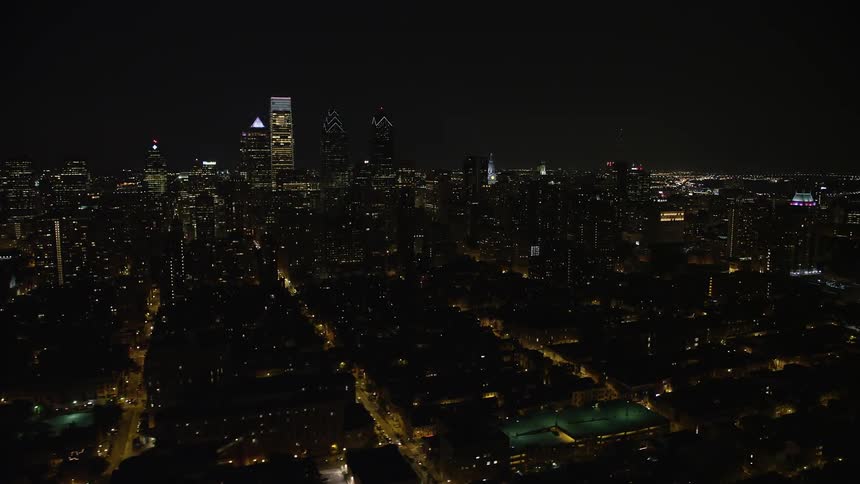 A stunning aerial view of the high-rises and skyscrapers in Downtown Philadelphia Pennsylvania at night