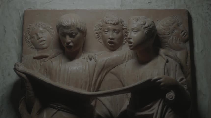Carving of people on a wall