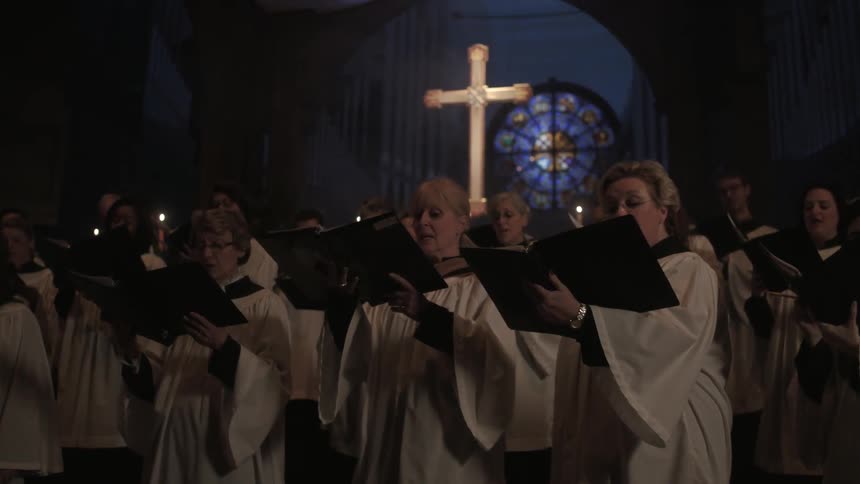 A church choir performing during an evening service