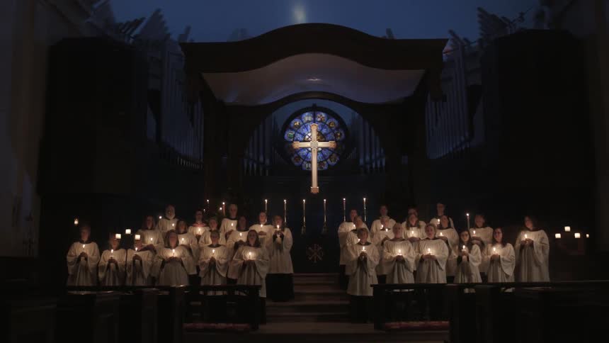 A choir is performing in a church