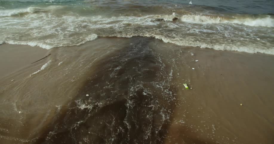 Polluted water running into the ocean