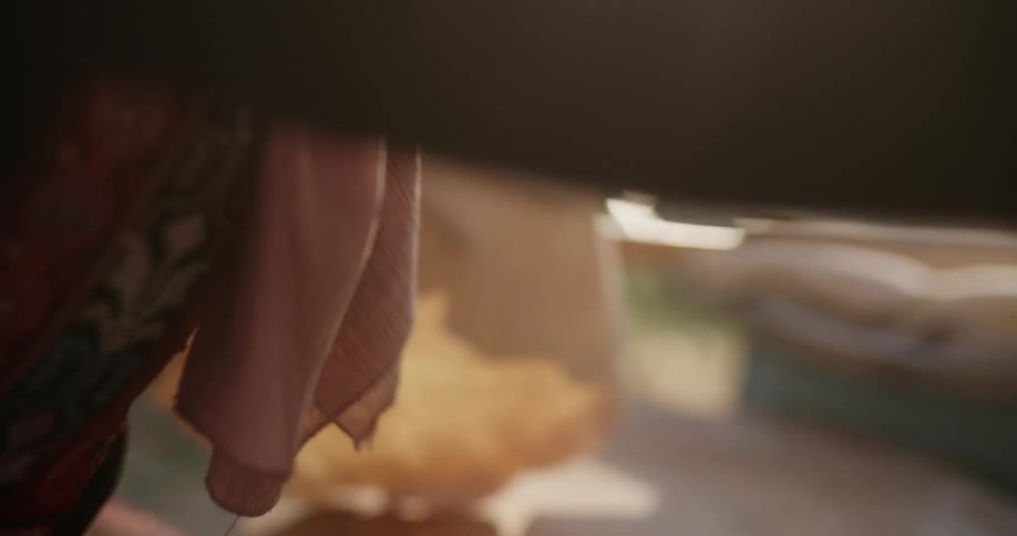 A person is tossing around tortilla dough