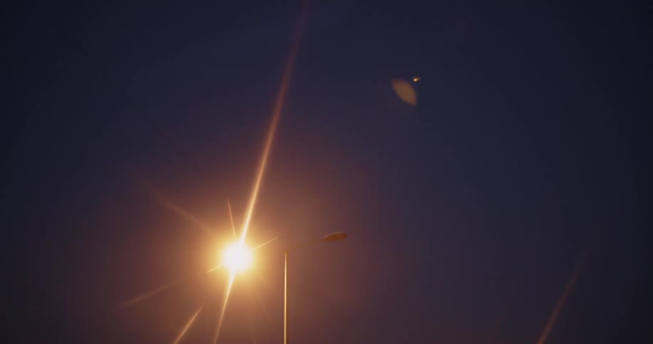 Light posts in a city is displayed at night