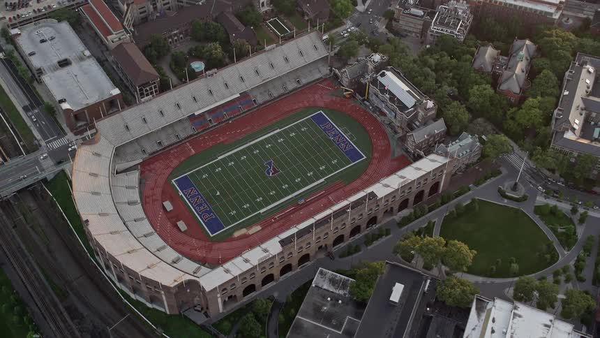 Ariel of a football stadium in middle of metropolis city