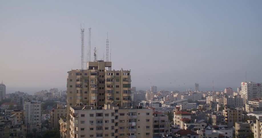 Aerial view of a downtown city is displayed at dusk