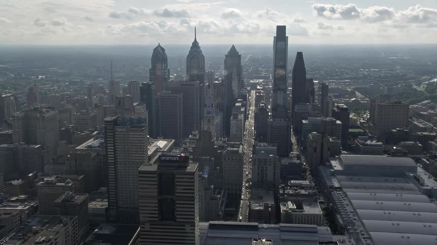Aerial footage of skyscrapers and City Hall viewed from the convention center in Downtown Philadelphia during the day