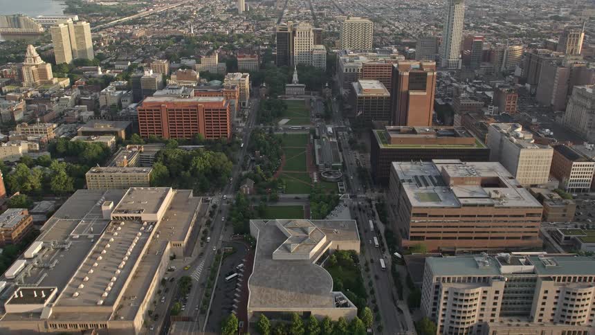 An aerial clip at dusk showcasing the famous Independence National Historical Park and Mall the Philadelphia Mint and other historical landmarks in Philadelphia Pennsylvania